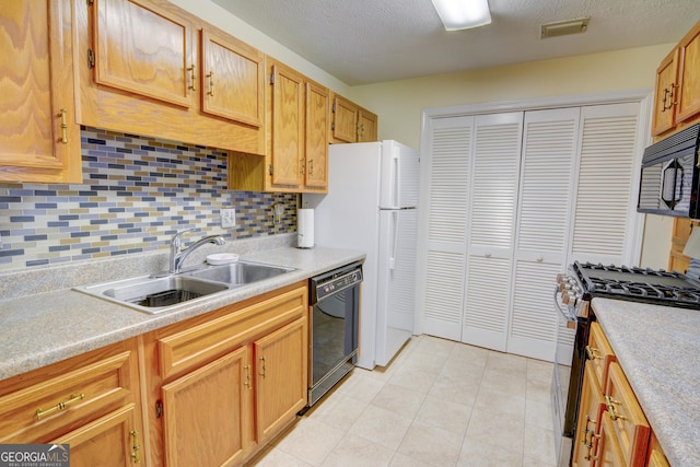 1005 Berkeley Woods Dr, Duluth, GA 30096 - kitchen with black appliances, a sink, light countertops, and backsplash