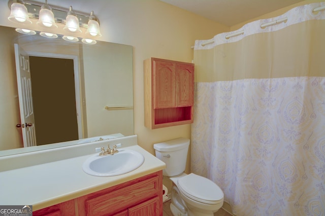 1005 Berkeley Woods Dr, Duluth, GA 30096 - full bathroom featuring toilet, vanity, and curtained shower