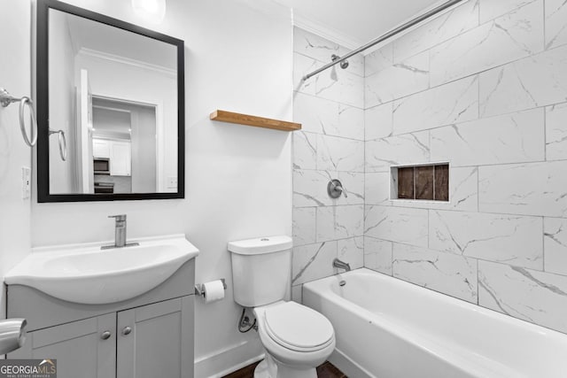 full bathroom featuring toilet, vanity,  shower combination, and crown molding