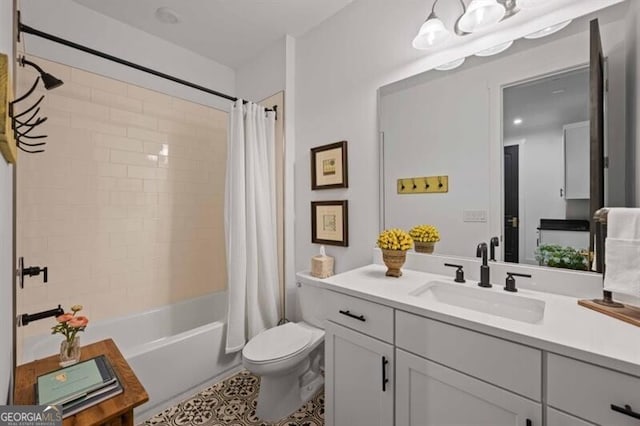 full bath with toilet, vanity, and shower / bathtub combination with curtain