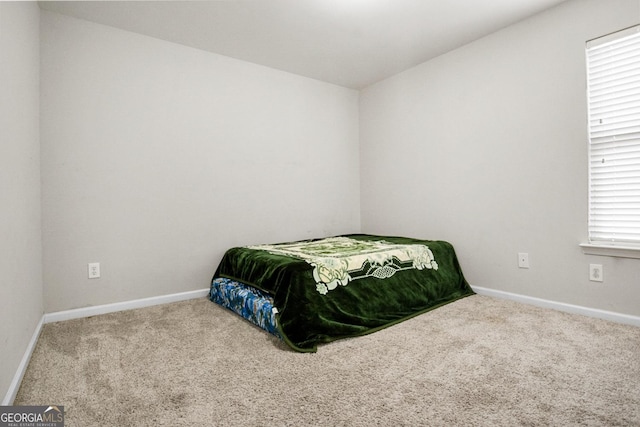 1502 Silver Mist Cir, Powder Springs, GA 30127 - bedroom featuring carpet and baseboards