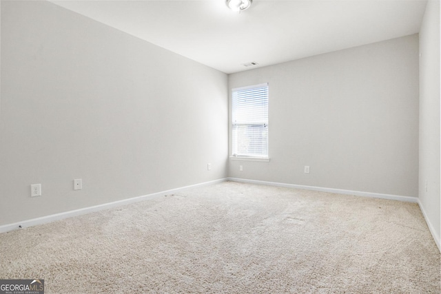 1502 Silver Mist Cir, Powder Springs, GA 30127 - spare room with baseboards, carpet flooring, and visible vents