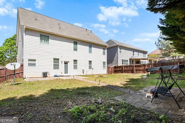 1502 Silver Mist Cir, Powder Springs, GA 30127 - back of property featuring a patio area, a fenced backyard, and a yard