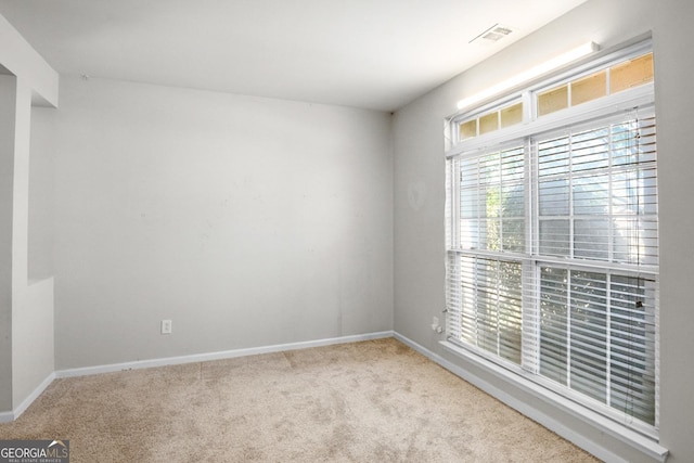 1502 Silver Mist Cir, Powder Springs, GA 30127 - carpeted empty room with visible vents and baseboards