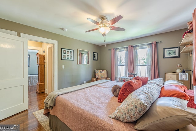 bedroom featuring wood finished floors and ceiling fan