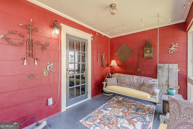 living area featuring ornamental molding