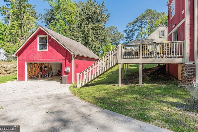 exterior space featuring a garage and concrete driveway