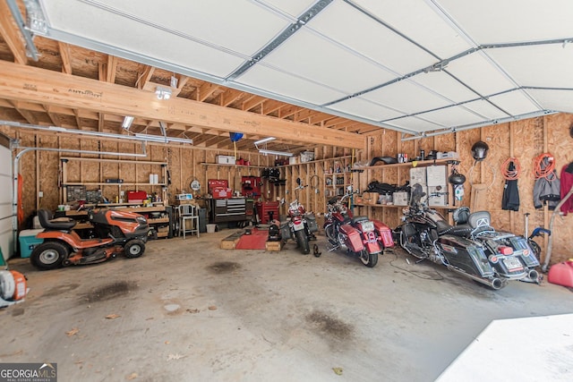 garage with a workshop area