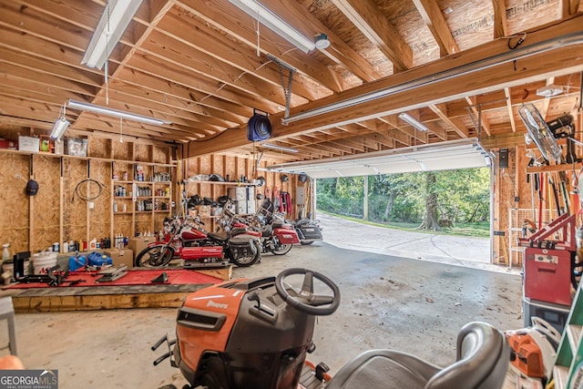 garage with a workshop area