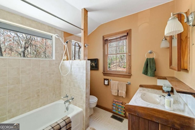 937 Fern Dr, Morganton, GA 30560 - full bathroom featuring visible vents, toilet, vanity, baseboards, and tiled shower / bath combo