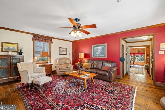 937 Fern Dr, Morganton, GA 30560 - living room with wood-type flooring, a healthy amount of sunlight, a ceiling fan, and ornamental molding