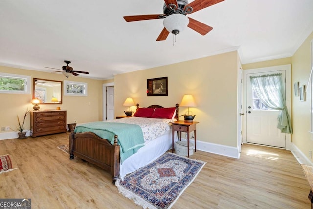937 Fern Dr, Morganton, GA 30560 - bedroom with baseboards, wood finished floors, and multiple windows