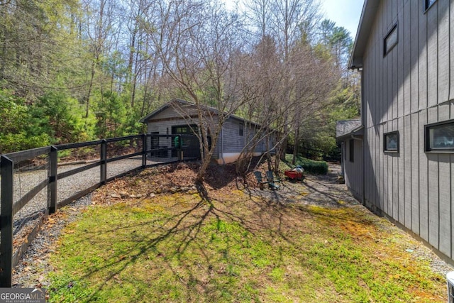 937 Fern Dr, Morganton, GA 30560 - view of yard featuring an outdoor structure and fence