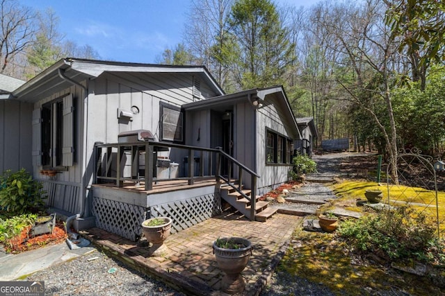 937 Fern Dr, Morganton, GA 30560 - view of side of property with a patio and a deck