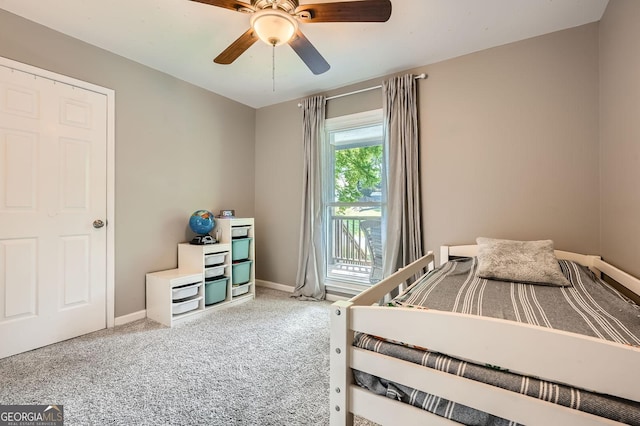 bedroom with carpet floors, access to outside, baseboards, and ceiling fan