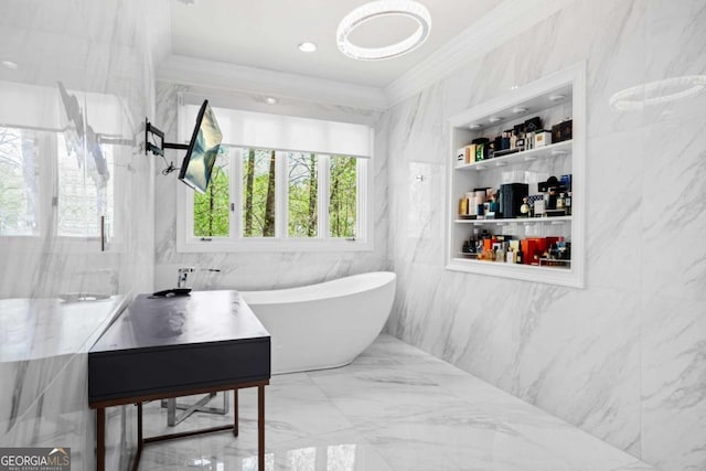 315 Mossy Pointe, Duluth, GA 30097 - bathroom featuring a freestanding bath, crown molding, and marble finish floor