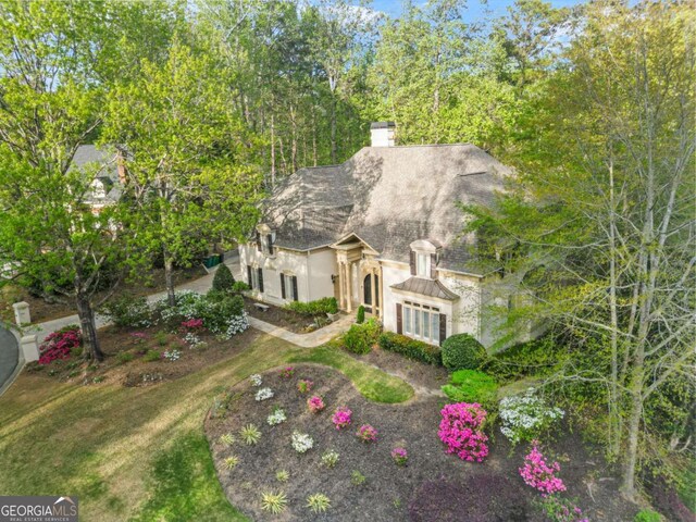315 Mossy Pointe, Duluth, GA 30097 - view of front of property with a chimney and stucco siding