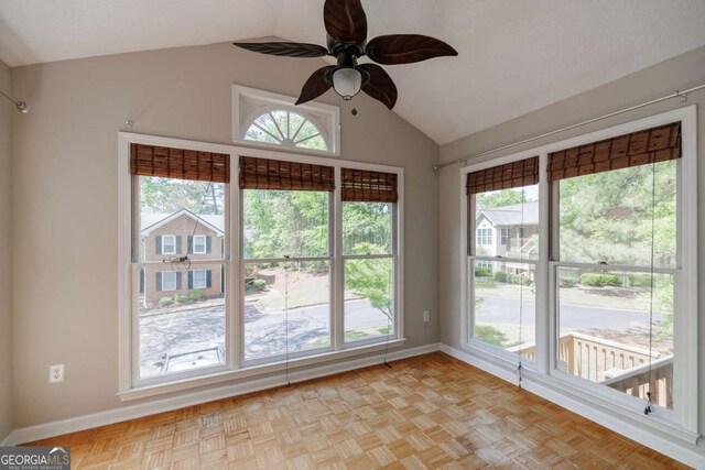 unfurnished sunroom with lofted ceiling