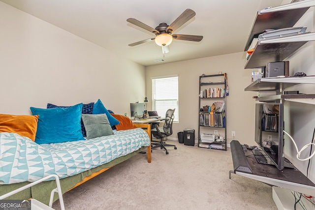 bedroom featuring baseboards, a ceiling fan, and carpet flooring