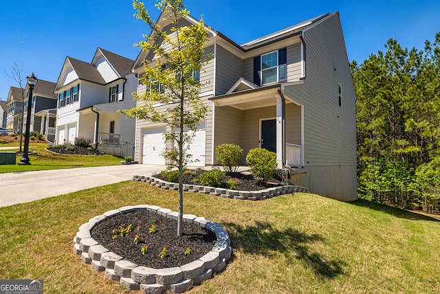 view of front of house with an attached garage, a front lawn, driveway, and a residential view