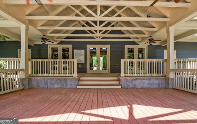 wooden deck featuring a ceiling fan and french doors