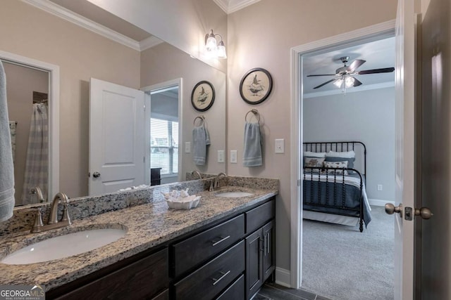 2424 Princeton Bend Way, Bogart, GA 30622 - ensuite bathroom with crown molding, double vanity, and ceiling fan