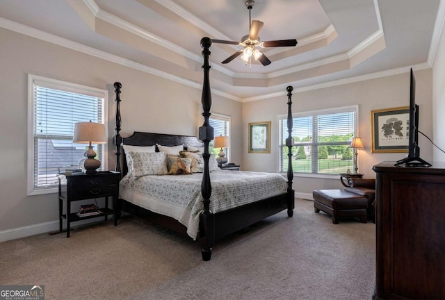 2424 Princeton Bend Way, Bogart, GA 30622 - bedroom featuring a tray ceiling, light colored carpet, crown molding, and a ceiling fan
