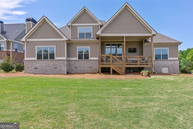 2424 Princeton Bend Way, Bogart, GA 30622 - rear view of house with brick siding, a lawn, a deck, and a ceiling fan
