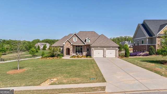 2424 Princeton Bend Way, Bogart, GA 30622 - craftsman house featuring a garage, driveway, and a front lawn