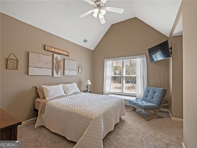 carpeted bedroom with vaulted ceiling, a ceiling fan, visible vents, and baseboards