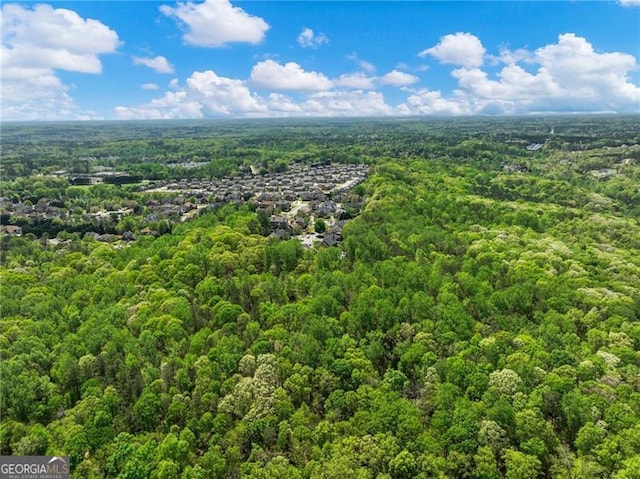 aerial view with a wooded view