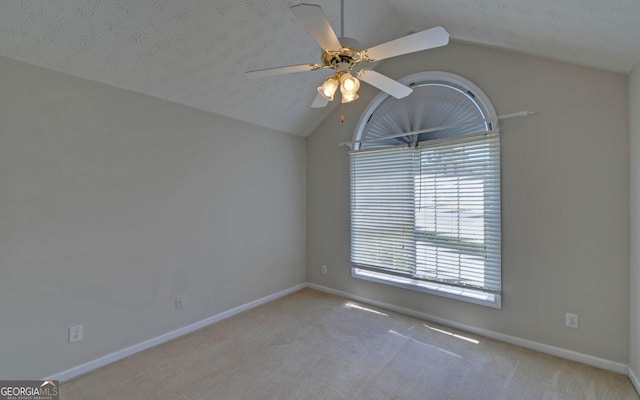 2800 Araglin Dr, Dacula, GA 30019 - unfurnished room with baseboards, lofted ceiling, carpet, and ceiling fan