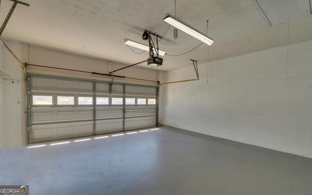 2800 Araglin Dr, Dacula, GA 30019 - garage featuring a garage door opener