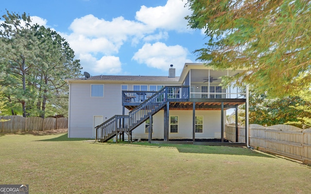 2800 Araglin Dr, Dacula, GA 30019 - back of property featuring stairway, a fenced backyard, a yard, ceiling fan, and a deck