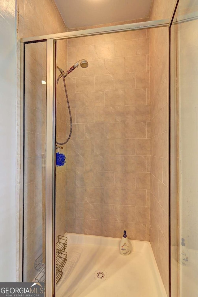 full bath featuring a stall shower