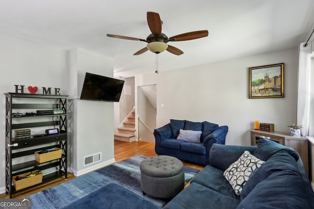 1649 Clairmont Way NE, Brookhaven, GA 30329 - living area with stairway, wood finished floors, visible vents, and ceiling fan