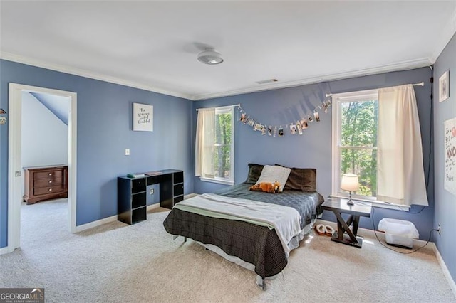 bedroom featuring crown molding, carpet flooring, and multiple windows