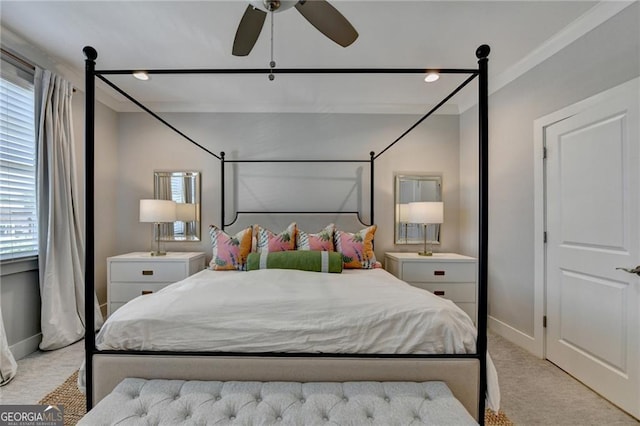 bedroom featuring a ceiling fan, baseboards, and light carpet