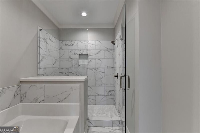 full bath with a bath, marble finish floor, a marble finish shower, and recessed lighting