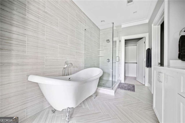 1268 Appleden Way Unit 17, Brookhaven, GA 30319 - bathroom with a stall shower, a soaking tub, and tile walls