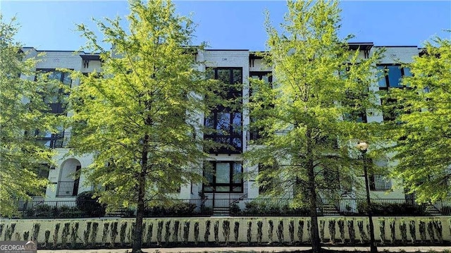1268 Appleden Way Unit 17, Brookhaven, GA 30319 - view of property featuring a fenced front yard