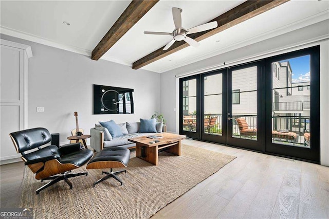 1268 Appleden Way Unit 17, Brookhaven, GA 30319 - living area featuring wood finished floors, french doors, beam ceiling, and a ceiling fan