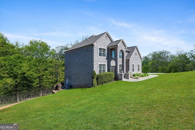 3206 Letha Woods Dr, Conyers, GA 30094 - view of side of home featuring a lawn
