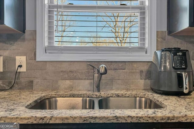 3206 Letha Woods Dr, Conyers, GA 30094 - kitchen view of tasteful backsplash and light stone countertops