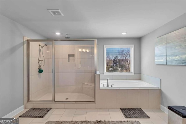 3206 Letha Woods Dr, Conyers, GA 30094 - bathroom featuring a stall shower, tile patterned floors, a garden tub, and recessed lighting