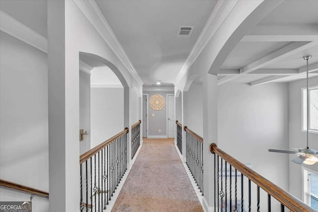 3206 Letha Woods Dr, Conyers, GA 30094 - corridor with ornamental molding, light carpet, arched walkways, and beam ceiling