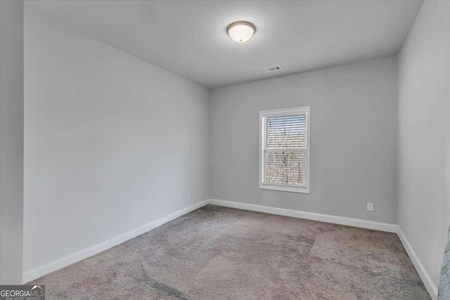 3206 Letha Woods Dr, Conyers, GA 30094 - carpeted empty room with baseboards
