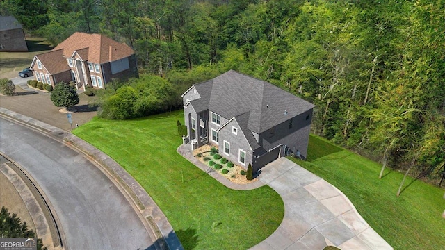 3206 Letha Woods Dr, Conyers, GA 30094 - view of subject property with a heavily wooded area