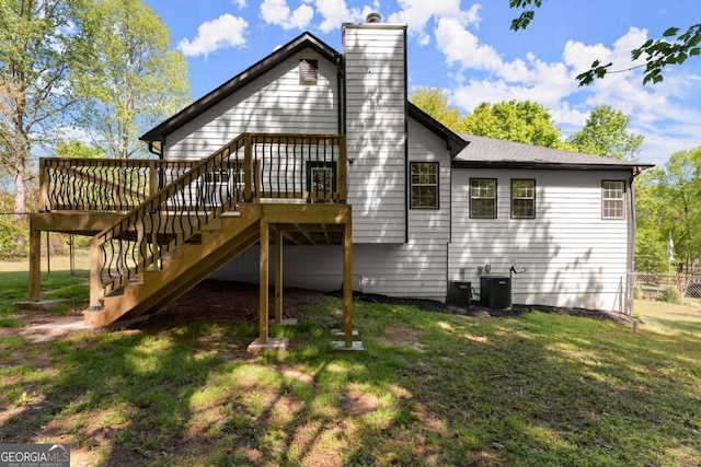 back of house with a wooden deck, central air condition unit, stairs, and fence