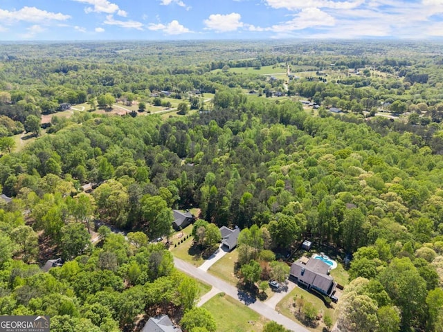 bird's eye view with a view of trees